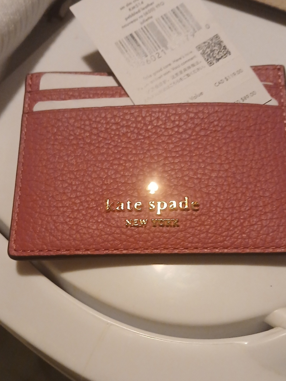 kate spade Pebbled Leather Card Holder in Dusty Rose with Gold Logo